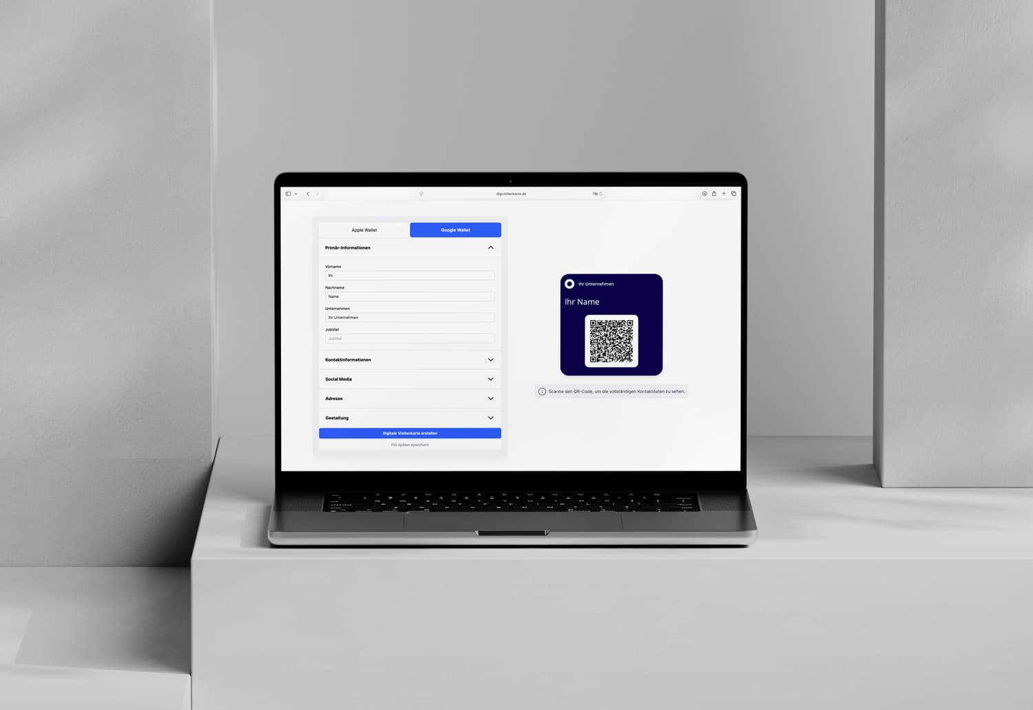 Laptop showing the DigiCard Pro generator with an input form and card preview